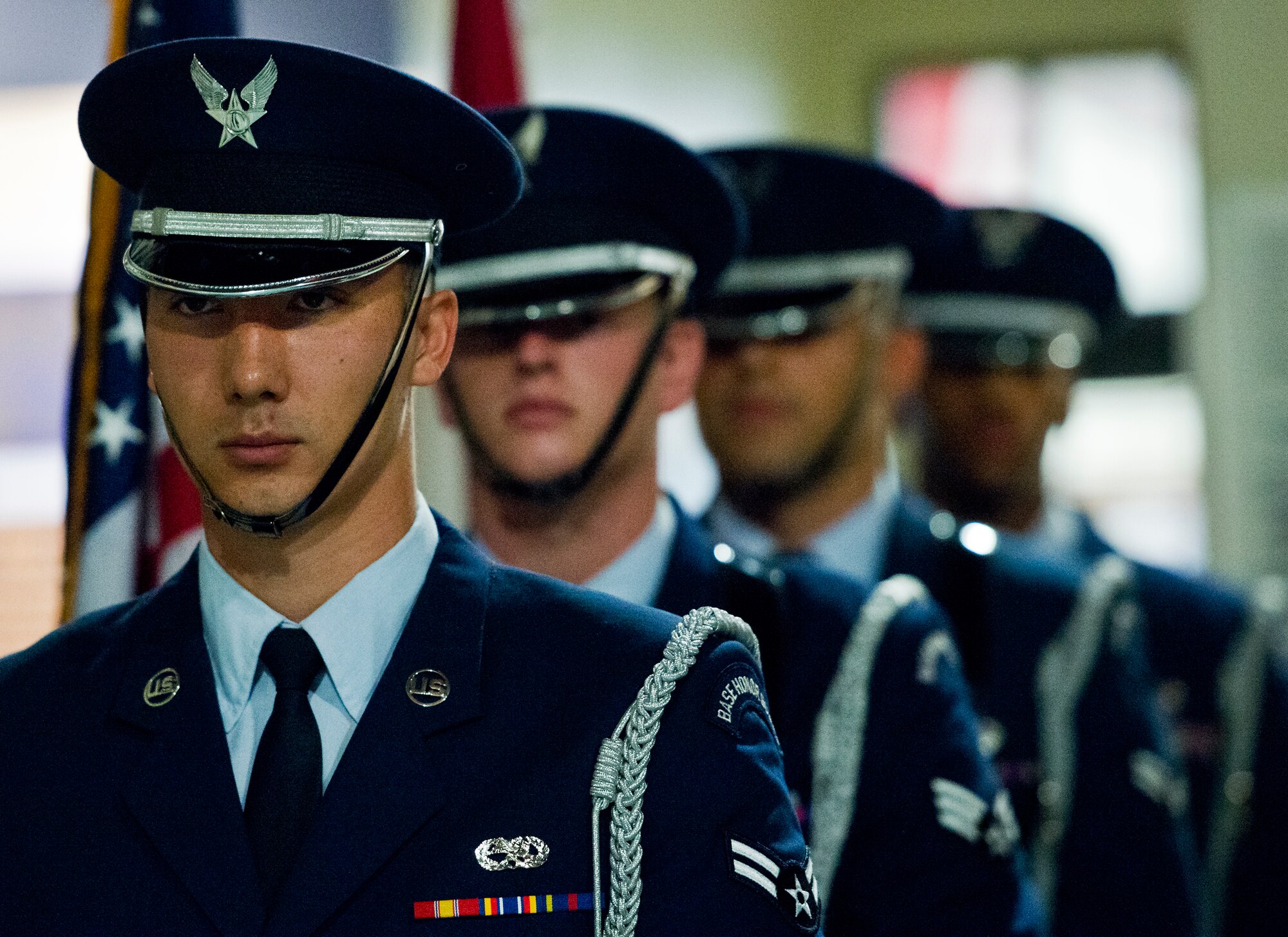 Members of the Eglin Honor Guard stand ready to bring in the colors prior to the base’s POW/MIA remembrance ceremony Sept. 19 at the Air Force Armament Museum. The ceremony paid tribute to those military members who have yet to return home from defending America. The event featured tributes, guest speakers and honor guard procedures. (U.S. Air Force photo/Samuel King Jr.)