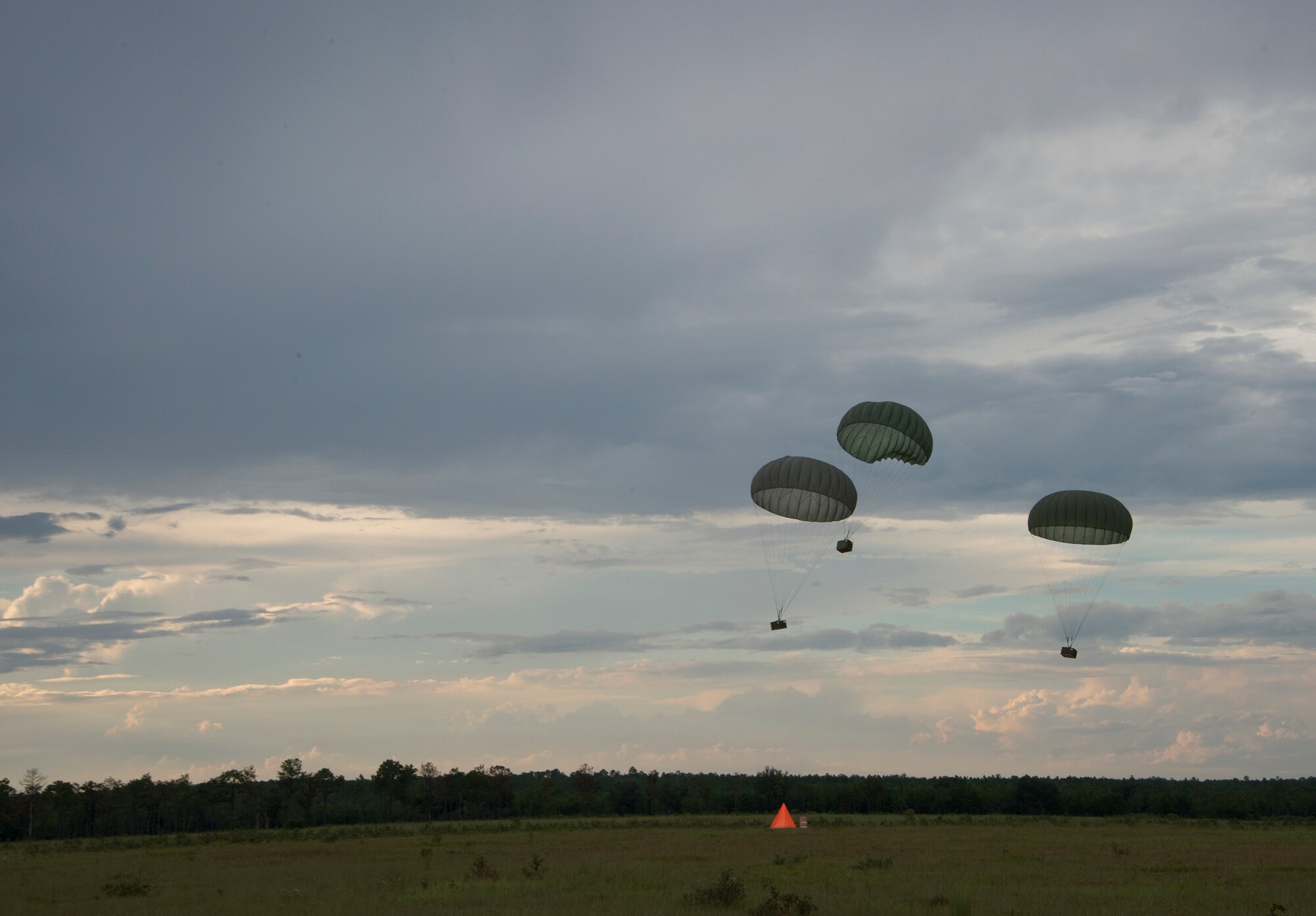 Three low cost low altitude bundles were dropped during a training mission Sept. 15, at Duke Field, Fla.  The Airmen of the SOLRS prepare and load an average of 24 to 48 loads per week to help train pilots and loadmasters from the 5th, 6th, and the 711th Special Operations Squadron. (Air Force photo/Tech. Sgt. Jasmin Taylor)