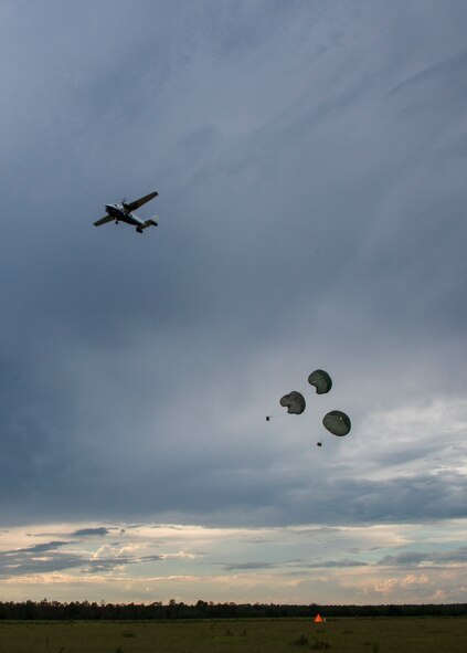 A C-145 Skytruck dropped three low cost low altitude bundles during a training mission Sept. 15, at Duke Field, Fla.  The Airmen of the SOLRS prepare and load an average of 24 to 48 loads per week to help train pilots and loadmasters from the 5th, 6th, and the 711th Special Operations Squadron. (Air Force photo/Tech. Sgt. Jasmin Taylor)