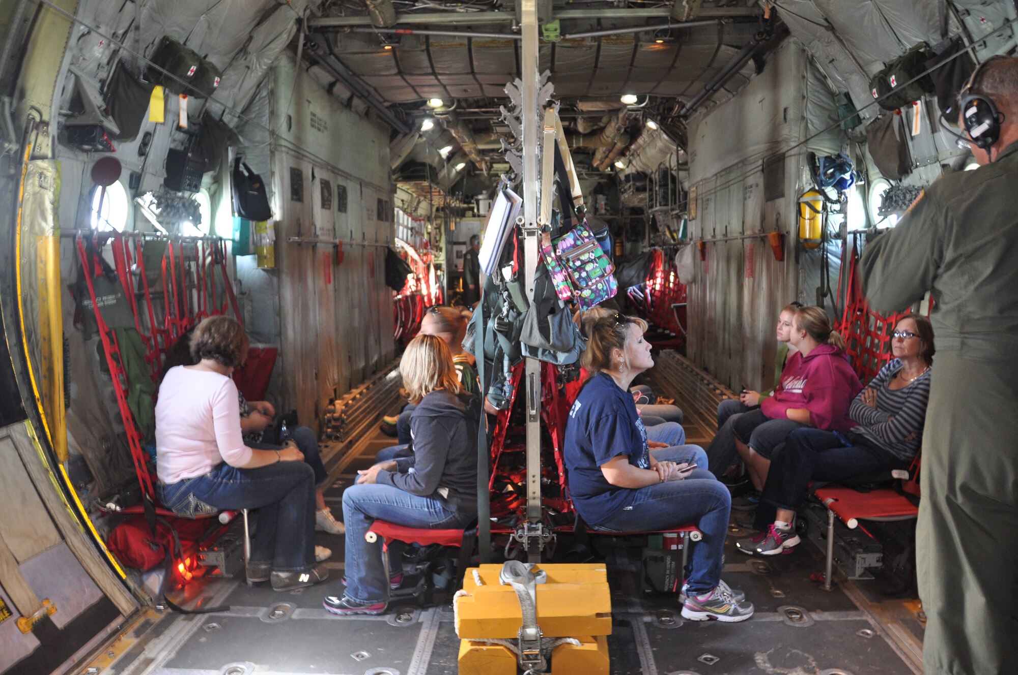 POPE ARMY AIRFIELD, N.C. - The 440th Airlift Wing sponsored a spouse flight aboard a C-130 Hercules here, Sept. 21.  For many of the spouses, this was their first flight on a military aircraft.  Making sure spouses and families know how important they are is a top priority of the 440th AW leadership. (U.S. Air Force photo by Airman 1st Class Kristin Kurtz)