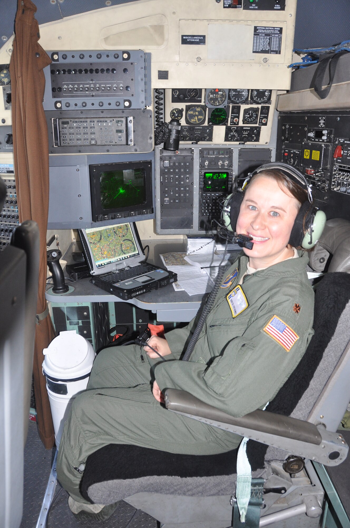 POPE ARMY AIRFIELD, N.C. - The 440th Airlift Wing sponsored a spouse flight aboard a C-130 Hercules here, Sept. 21.  About 50 spouses were introduced to the C-130 flying community so they can better understand the importance of their reservist's mission.  Maj. Kristie Piotrowicz, 95 Airlift Squadron here, was assigned as the flight navigator.  (U.S. Air Force photo by Airman 1st Class Kristin Kurtz)