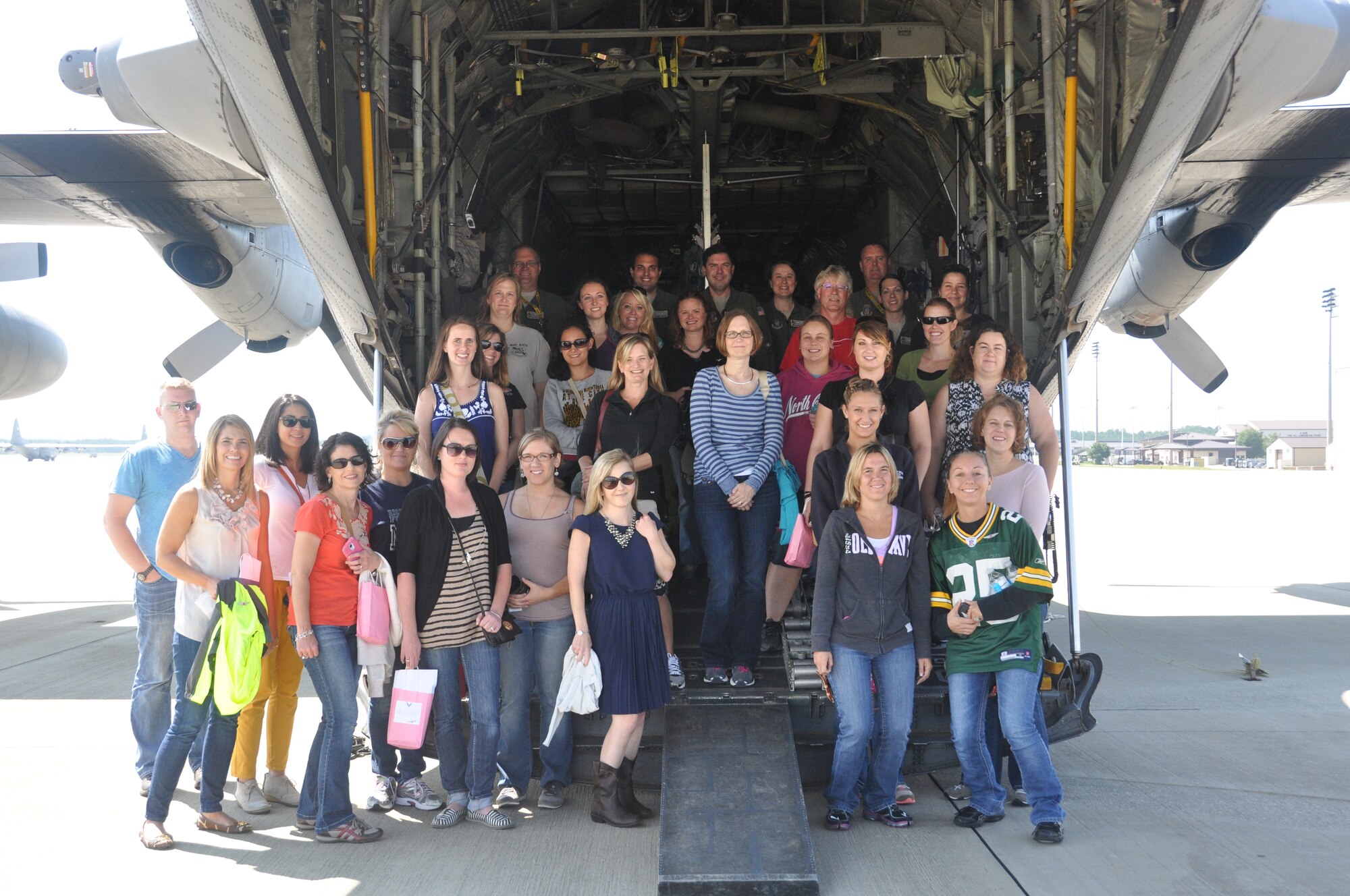 POPE ARMY AIRFIELD, N.C. - The 440th Airlift Wing sponsored a spouse flight aboard a C-130 Hercules here, Sept. 21.  About 50 spouses took to the skies to see first-hand what it is their reservists do supporting the wing’s mission at Pope Field.  (U.S. Air Force photo by Airman 1st Class Kristin Kurtz)