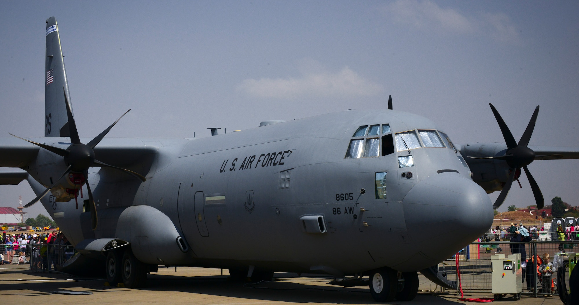 A C-130J Super Hercules sits on a flightline at the Africa Aerospace & Defence Expo at Waterkloof Air Force Base, South Africa, Sept. 20, 2014.  The C-130 was part of a total-force team of Guard, Reserve and active-duty Soldiers and Airmen at the expo. (U.S. Air Force photo/Staff Sgt. Travis Edwards)