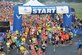 Runners take off from the starting line of the 2104 U.S. Air Force Marathon Sept. 20, 2014, at Wright-Patterson Air Force Base, Ohio. The race set an attendance record with approximately 15,000 runners. (U.S. Air Force photo/Mike Libecap)