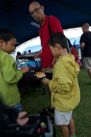 Marine Corps Community Services hosted the 2014 Summer Music Festival at Penny Lake fields aboard Marine Corps Air Station Iwakuni, Japan, Sept. 6. Attractions ranged from free food, live performances, a kid’s play land, and a feature performance from country music song writers Annie Bosko and Danny Myrick.