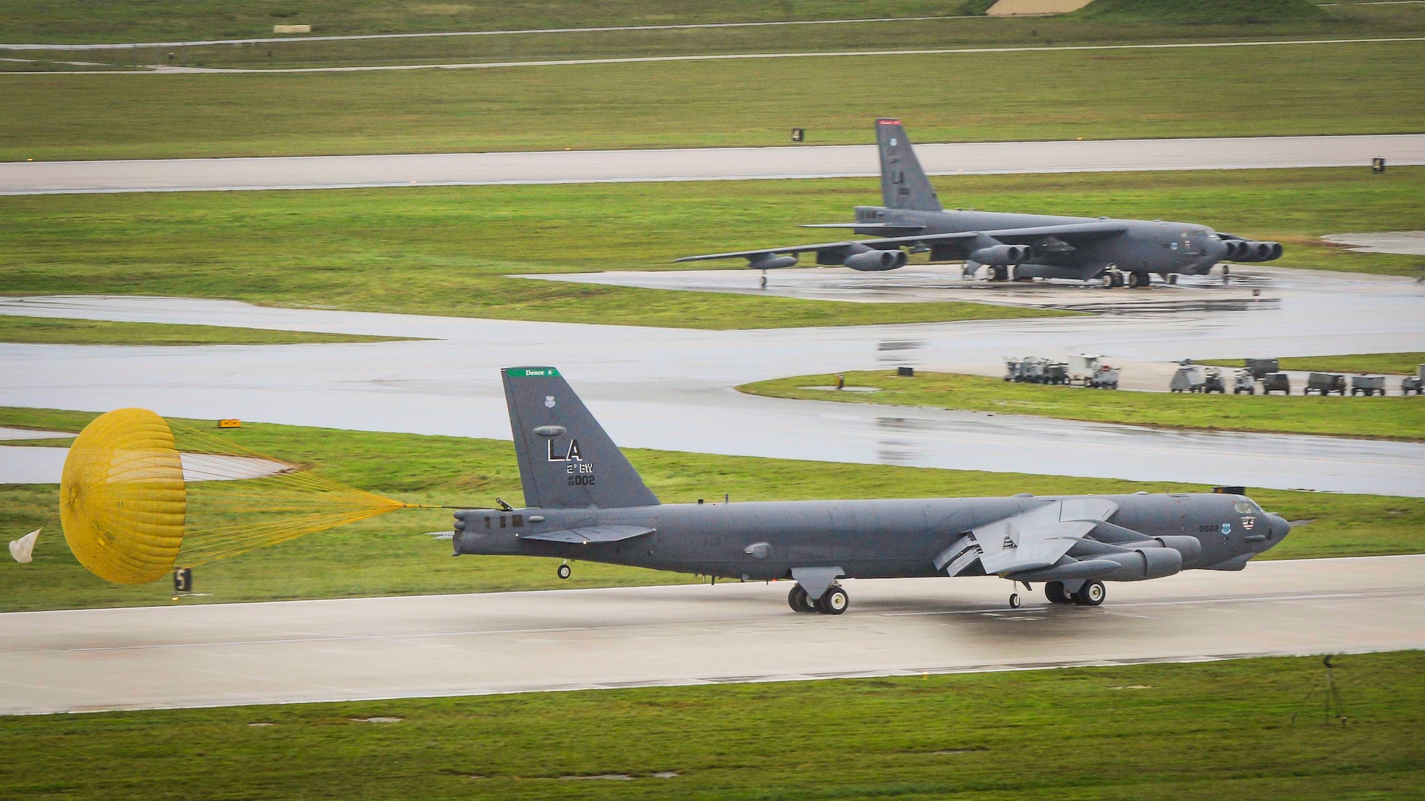 A U.S. Air Force B-52 Stratofortress strategic bomber with the 20th Bomb Squadron, operating under the tactical control of the 36th Operations Group, lands at Andersen Air Force Base, Guam, during Valiant Shield 2014, Sept. 16, 2014. Valiant Shield is a U.S.-only exercise, integrating U.S. Navy, Air Force, U.S. Army and U.S. Marine Corps assets, offering real-world joint operational experience to develop capabilities that provide a full range of options to defend U.S. interests and those of its allies and partners. (U.S. Marine Photo by Lance Cpl. Abbey Perria/Released)