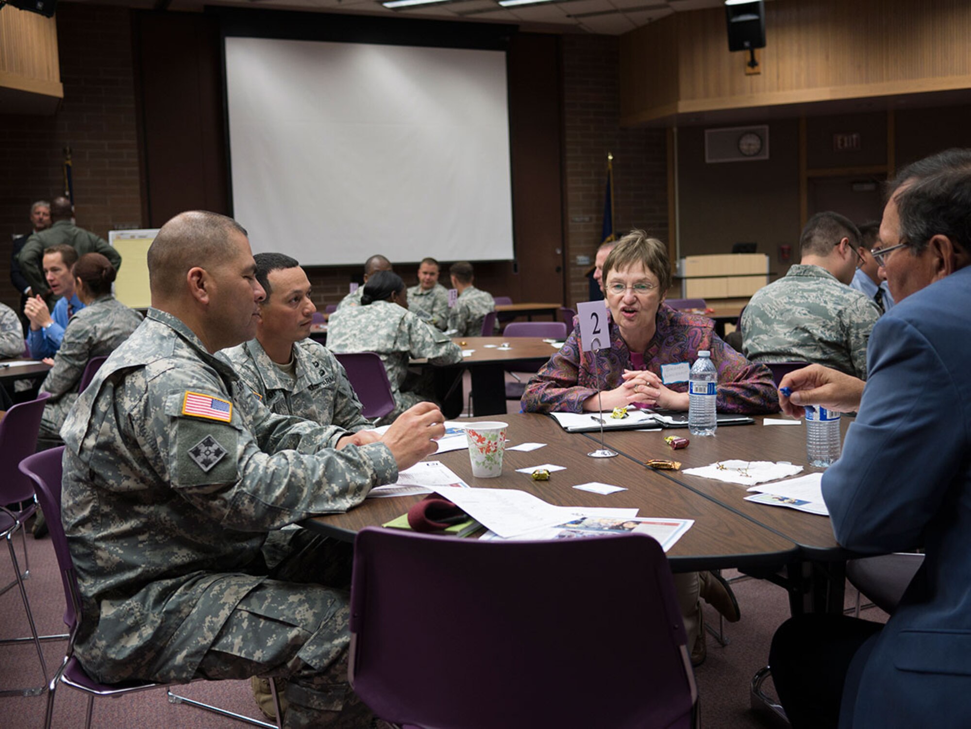 Principals and Soldiers plan events during the School Partnership Program Kick Off event at the King Career Center, Sept. 10. The program creates strategies for how the JBER and education communities can work together to build stronger relationships. (U.S. Air Force photo/ Senior Airman Omari Bernard)