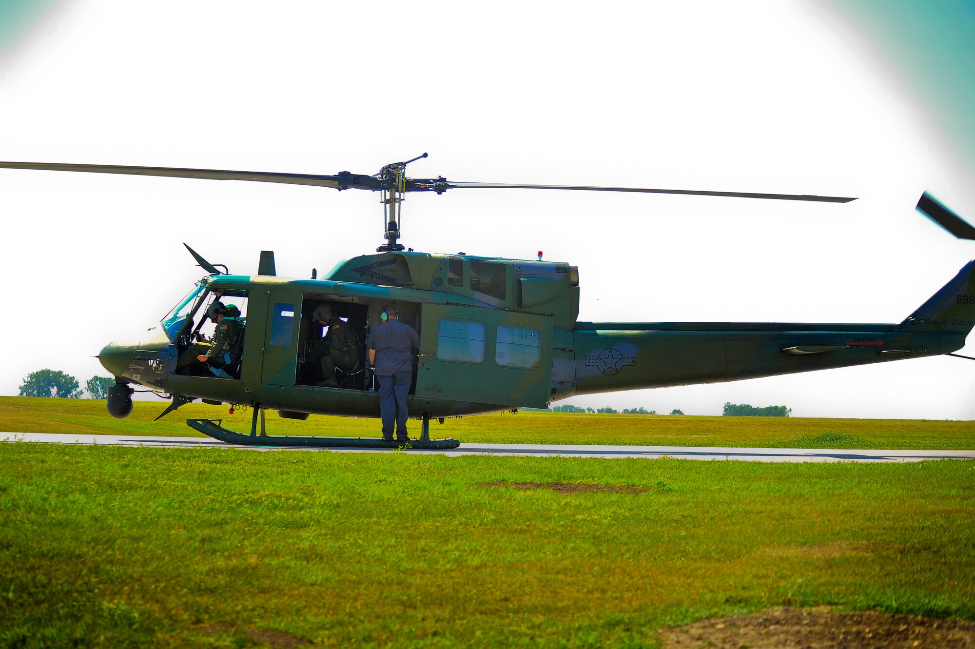 Members of the 54th Helicopter Squadron prepare for take off on Minot Air Force Base, N.D., Aug. 13, 2014.  The 54th HS team will compete against teams from F.E. Warren AFB, Wyo. and Malmstorm AFB, Mont. for the Bourland Trophy during the Global Strike Challenge. (U.S. Air Force photo/Senior Airman Brittany Y. Bateman)