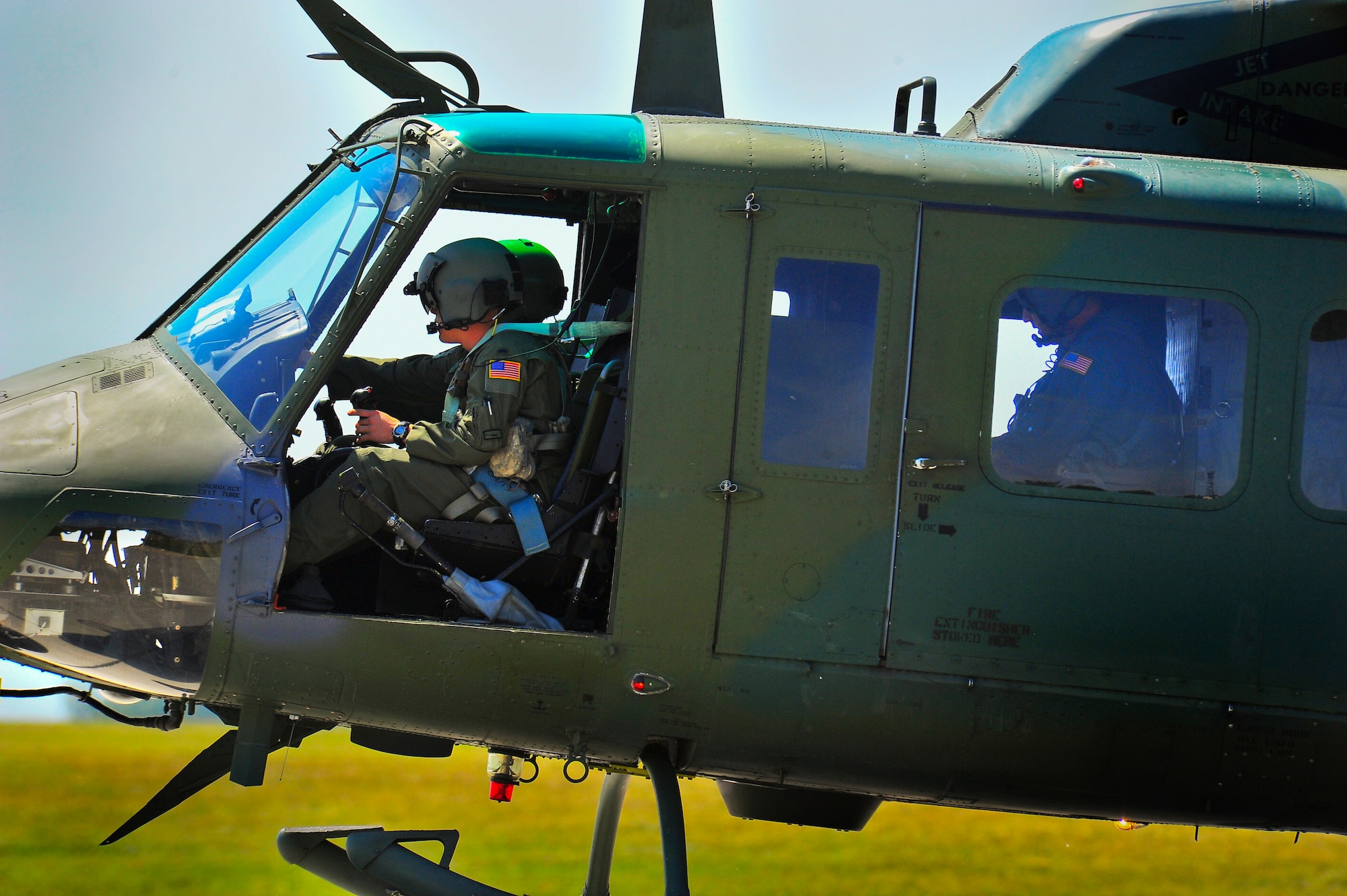Members of the 54th Helicopter Squadron prepare for take off on Minot Air Force Base, N.D., Aug. 13, 2014.  The 54th HS team will compete against teams from F.E. Warren AFB, Wyo. and Malmstorm AFB, Mont. for the Bourland Trophy during the Global Strike Challenge. (U.S. Air Force photo/Senior Airman Brittany Y. Bateman)