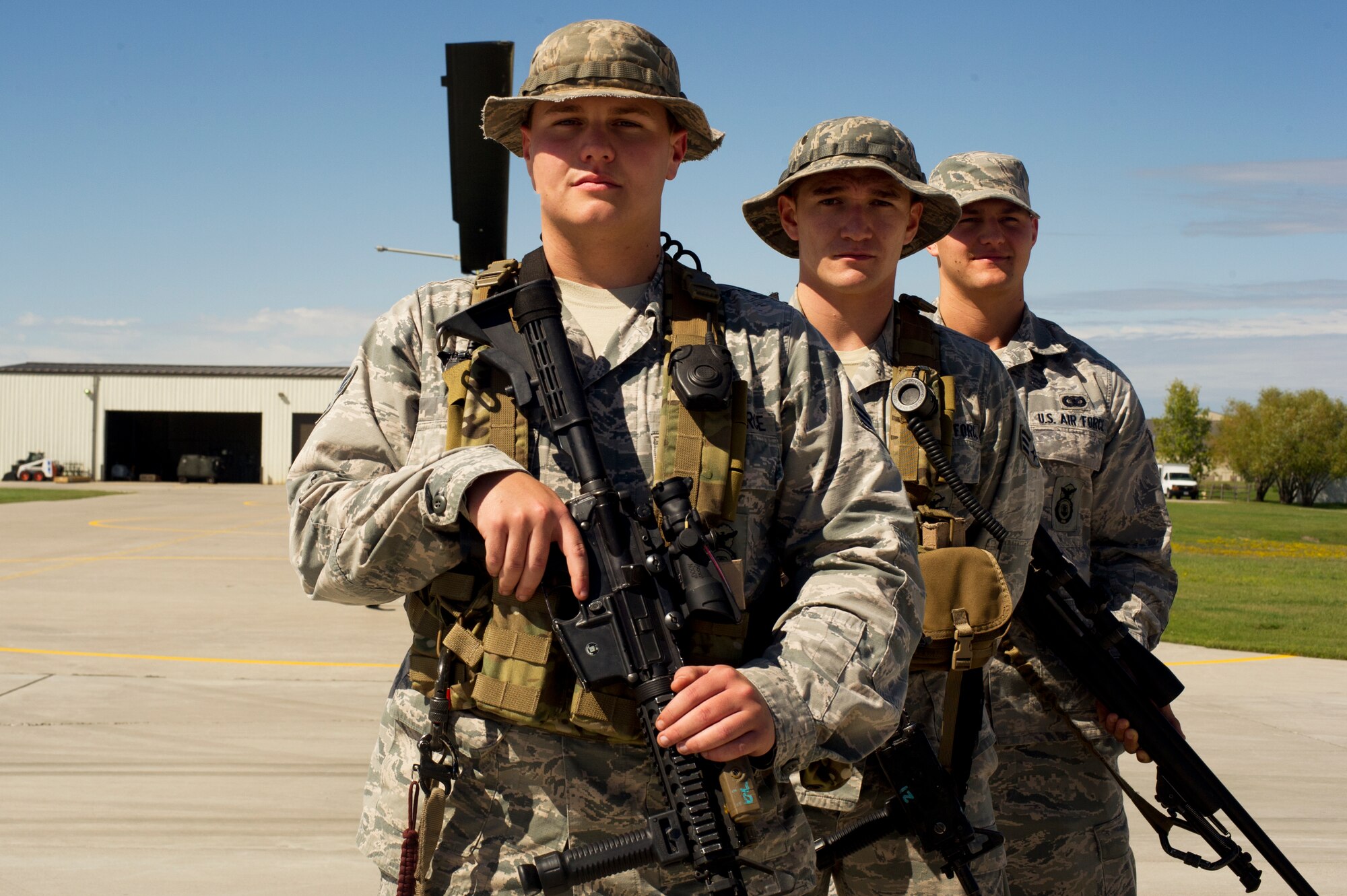 The 91st Security Forces Group tactical response force team pose for a photo on Minot Air Force Base, N.D., Sept. 3, 2014.The TRF team will compete against teams from F.E. Warren AFB, Wyo. and Malmstorm AFB, Mont. during the Global Strike Challenge.  (U.S. Air Force photo/Senior Airman Brittany Y. Bateman)