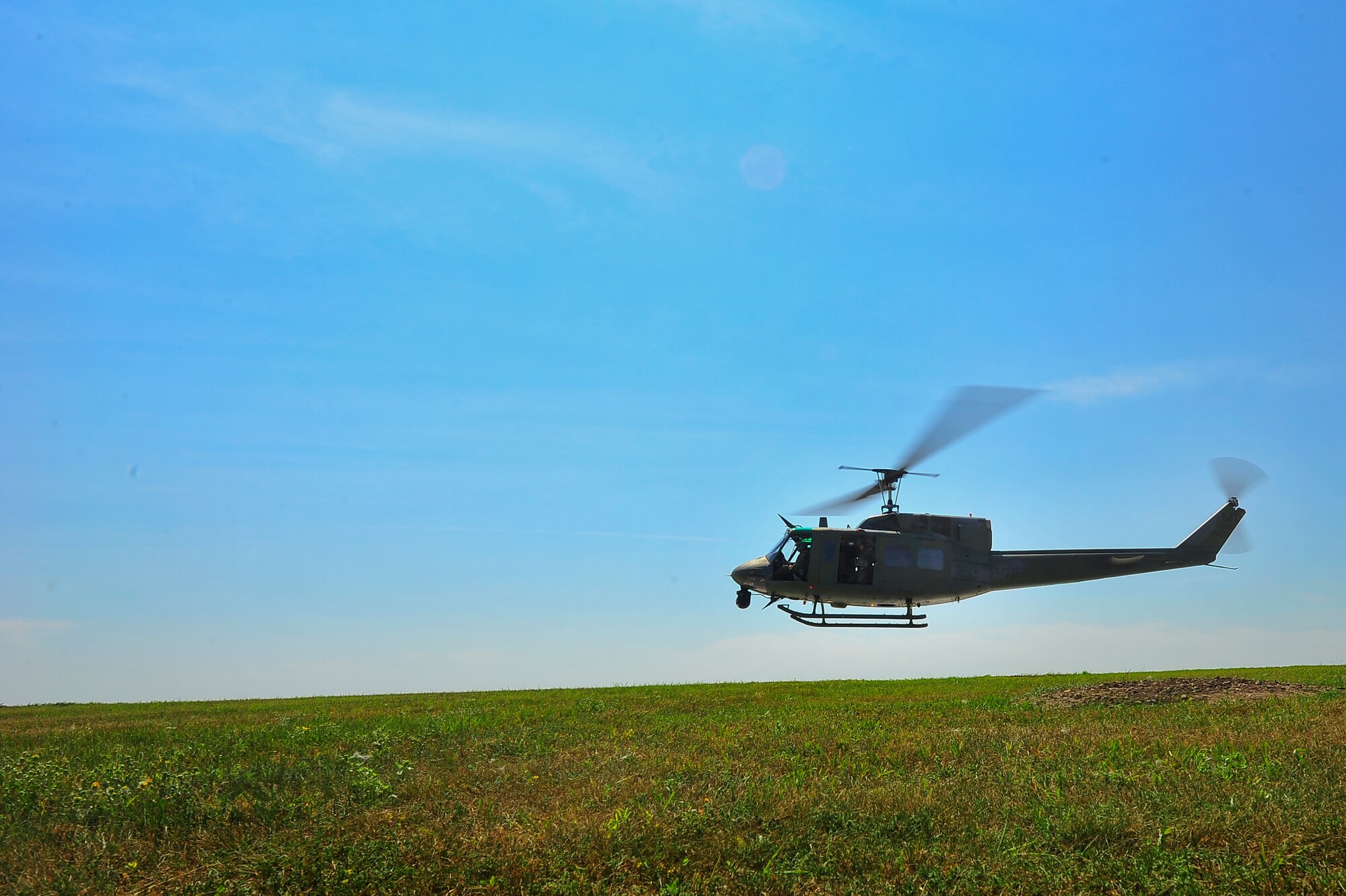 A UH-N1 Huey takes off on Minot Air Force Base, N.D., Aug. 13, 2014.  The 54th Helicopter Squadron team will compete against teams from F.E. Warren Air Force Base, Wyo. and Malmstorm AFB, Mont. for the Bourland Trophy during the Global Strike Challenge.(U.S. Air Force photo/Senior Airman Brittany Y. Bateman)