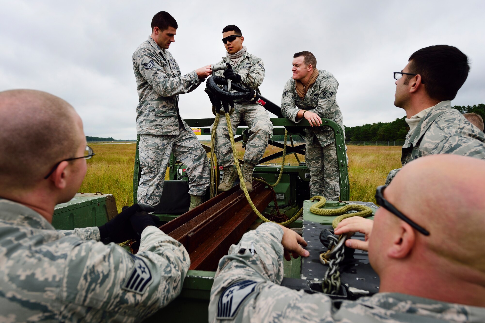 JOINT BASE MCGUIRE-DIX-LAKEHURST, N.J. -- Members of the 621st Contingency Response wing are instructed on techniques during the revamped sling-load training here, Sept. 16, 2014. The new sling-load training is scheduled to be conducted quarterly. (U.S. Air Force photo by Staff Sgt. Gustavo Gonzalez)