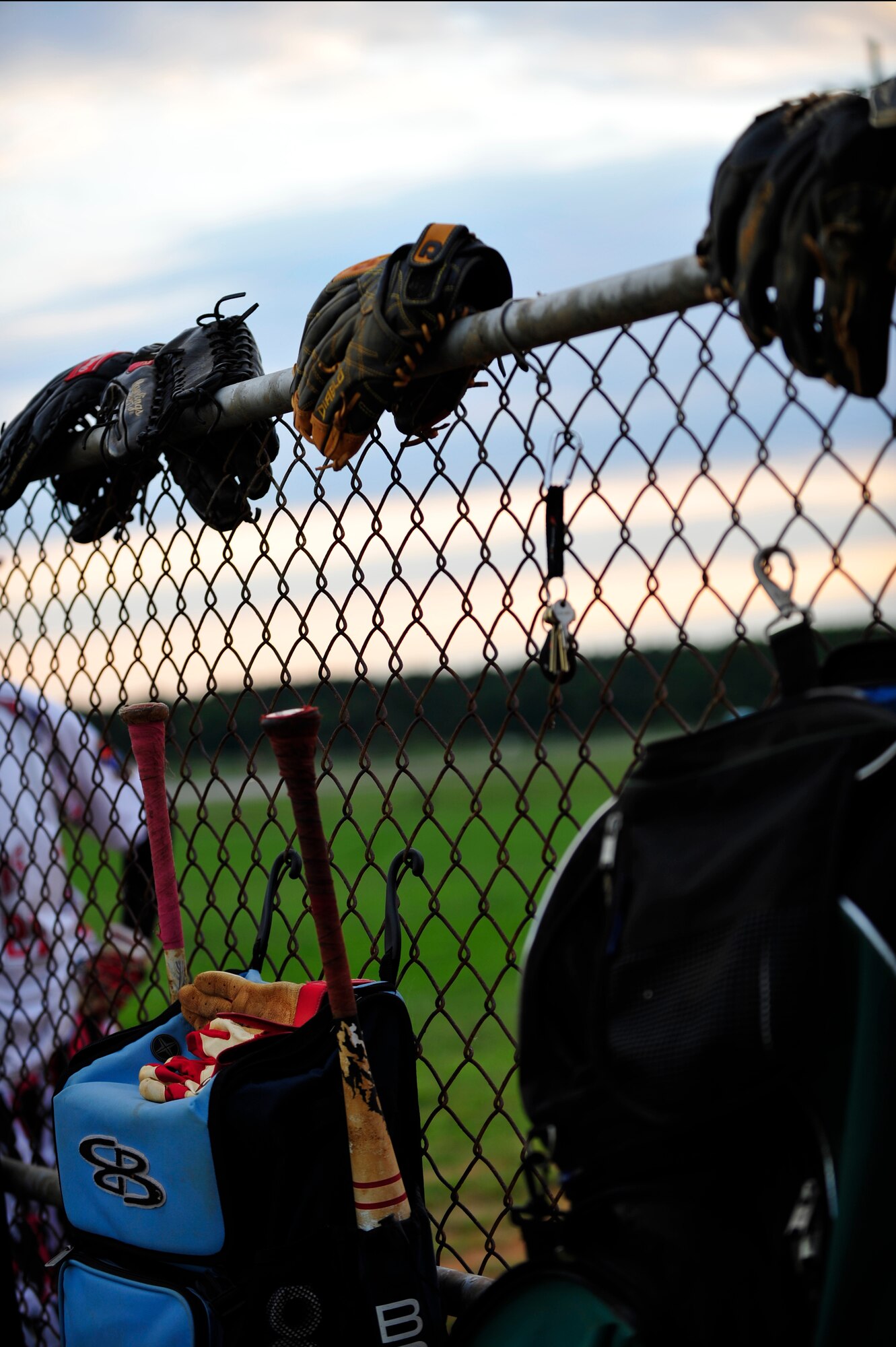 A 45th Intelligence Squadron batter, practices before his turn to step up to home plate during the Intramural Softball Championship at Langley Air Force Base, Va., Sept. 18, 2014. The 633rd Force Support Squadron hosts other sports to include basketball and bowling. (U.S. Air Force photo by Airman 1st Class Breonna Veal/Released)