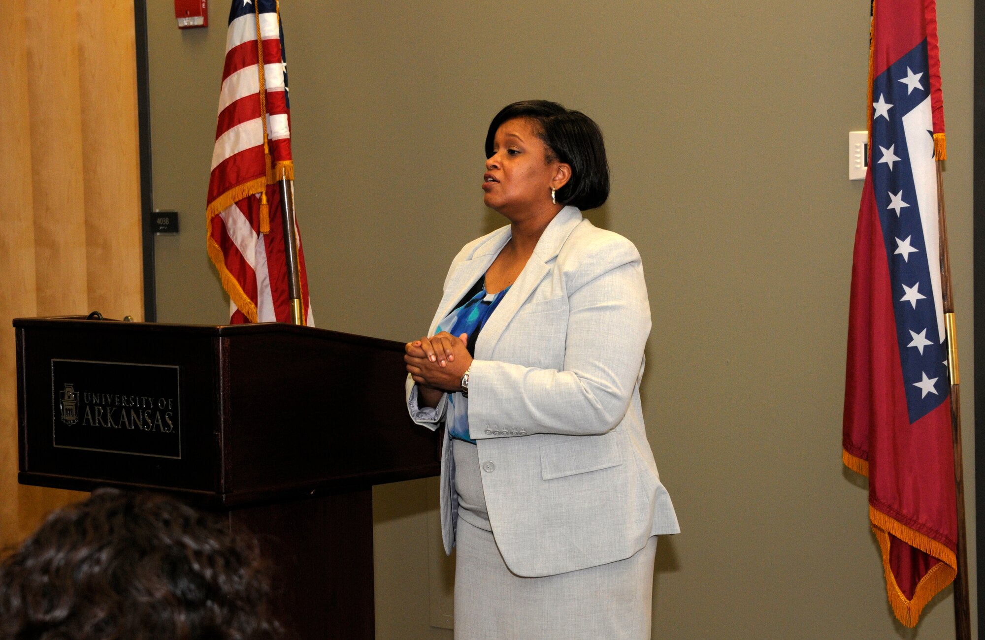 Maj. Danielle Wood, 188th Wing Equal Opportunity chief, addresses a gathering during an Employer Support of the Guard and Reserve Patriot Award presentation held at the University of Arkansas Center for Multicultural and Diversity Education in Fayetteville, Arkansas, Sept. 19, 2014. Wood recognized her employer and supervisors for their support of her Air National Guard career during the event. Dr. Wood is also the UA Office of Equal Opportunity & Compliance director.  (U.S. Air National Guard photo by Maj. Heath Allen/Released) 