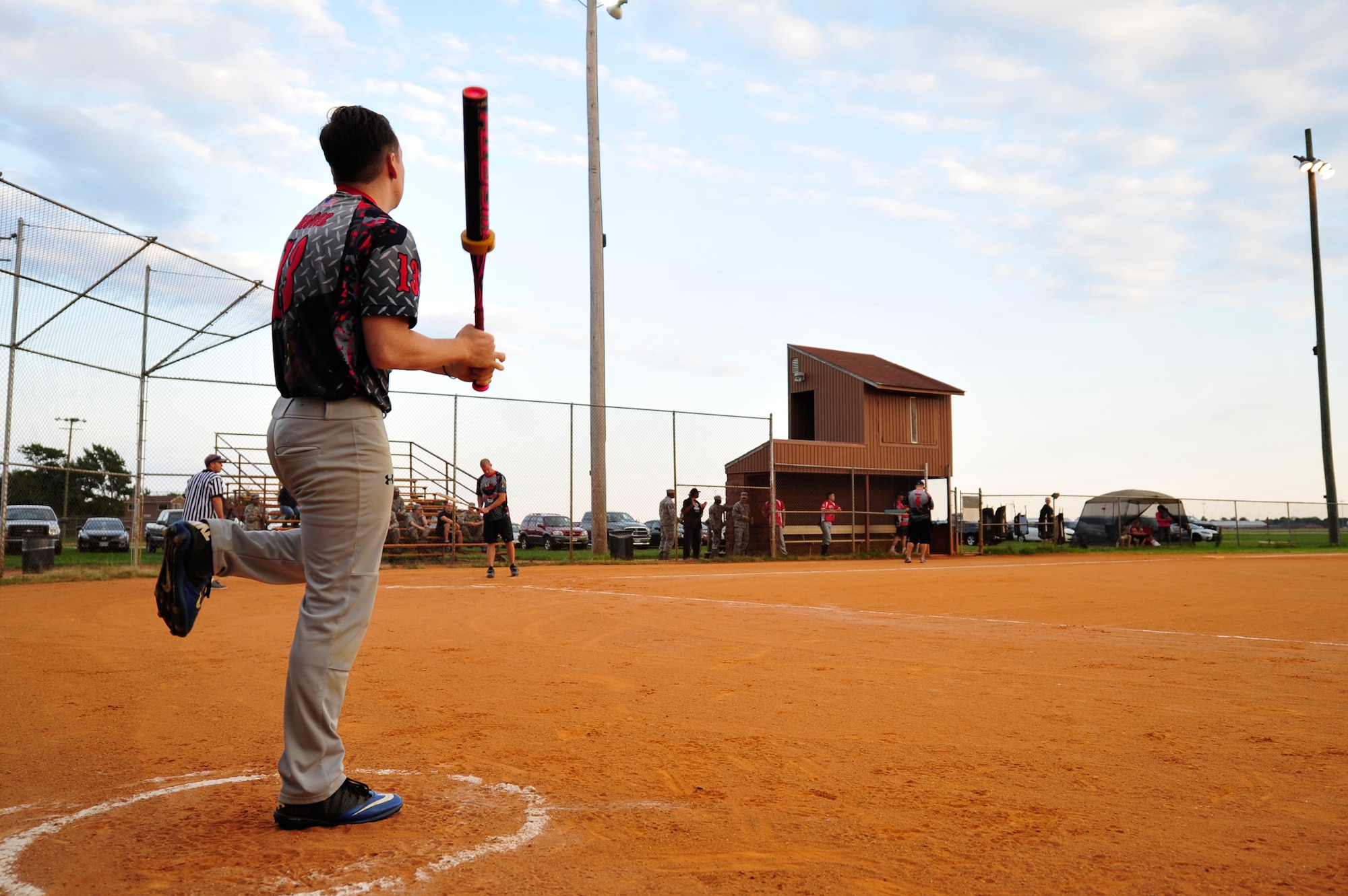 A 45th Intelligence Squadron batter, practices before his turn to step up to home plate during the Intramural Softball Championship at Langley Air Force Base, Va., Sept. 18, 2014. The 633rd Force Support Squadron hosts other sports to include basketball and bowling. (U.S. Air Force photo by Airman 1st Class Breonna Veal/Released)