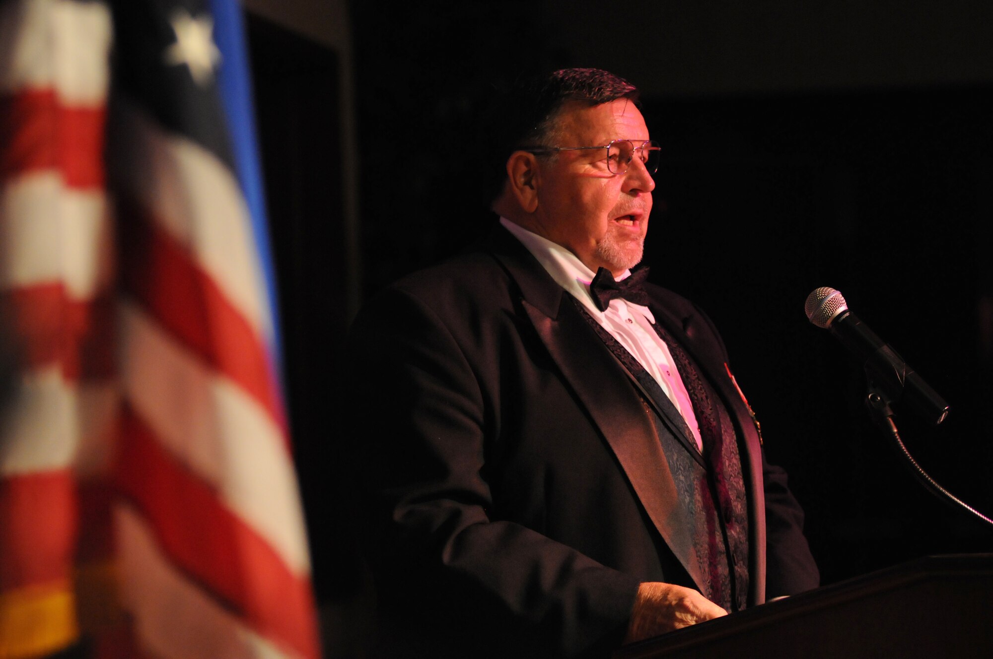 Retired Capt. William “Bill” Robinson, former prisoner of war, makes remarks as the guest speaker during the Air Force’s 67th Birthday Ball on Sept. 20, 2014, at the Bay Breeze Event Center, Keesler Air Force Base, Miss. The event, sponsored by the Air Force Association John C. Stennis Chapter #332, also commemorated the 50th anniversary of the Vietnam War. (U.S. Air Force photo by Kemberly Groue)