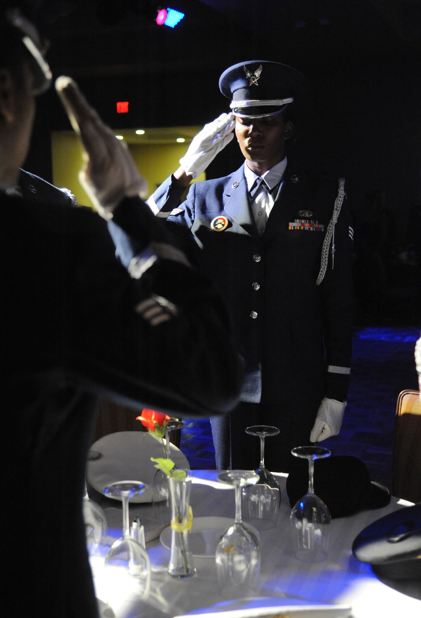 Members of the Keesler Honor Guard perform a Prisoner of War/Missing in Action table ceremony during the Air Force’s 67th Birthday Ball on Sept. 20, 2014, at the Bay Breeze Event Center, Keesler Air Force Base, Miss. The event, sponsored by the Air Force Association John C. Stennis Chapter #332, also commemorated the 50th anniversary of the Vietnam War. (U.S. Air Force photo by Kemberly Groue)