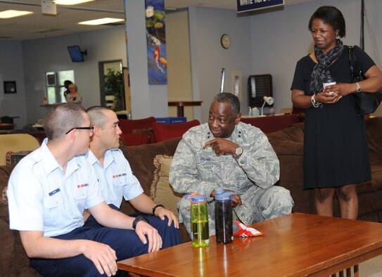 Maj. Gen. Mark Brown, 2nd Air Force commander, and his wife speak to Airman Basic Devin Shaw and Airman 1st Class Stephen Talavera, 338th Training Squadron, while touring the Levitow Training Support Center during a two-day immersion tour of the base Sept. 16-17, 2014, Keesler Air Force Base, Miss.  The purpose of the tour was to learn the integration of the base’s mission, operations and personnel.  Brown also toured the 81st Medical Group, 81st Mission Support Group and held an all call.  (U.S. Air Force photo by Kemberly Groue)