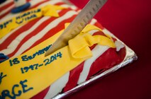 An Air Force birthday cake is cut at the dining facility on Minot Air Force Base, N.D., Sept. 18, 2014. This year marks the AF’s 67th birthday, as it was activated on Sept. 18, 1947. (U.S. Air Force photo/Airman 1st Class Apryl Hall)
