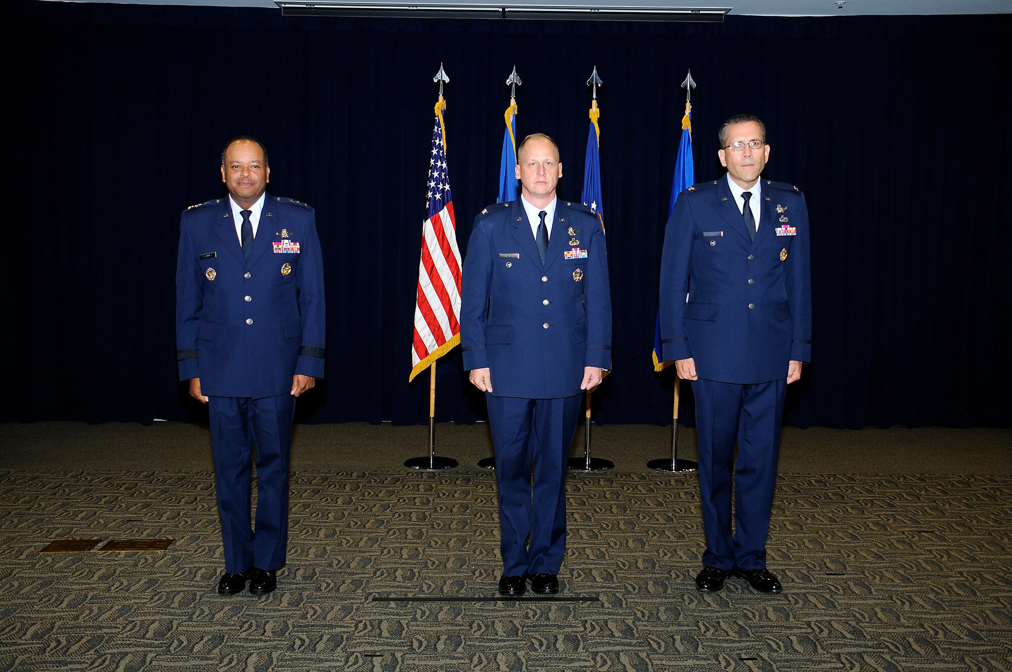 During a ceremony officiated by Lt. Gen. Sam Greaves, Space and Missile Systems commander, Sept. 8 at Los Angeles Air Force Base, El Segundo, Califl, Col. Mike Guetlein took command of SMC’s Remote Sensing Systems Directorate from Col. James Planeaux. Guests at the ceremony included family, friends and dignitaries such as William Maikisch, SMC’s former executive director. (Photo by Joe Juarez)