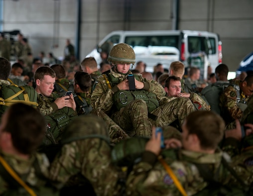 Paratroopers from eight different nations wait to board aircraft during the 70th Anniversary of Operation Market Garden on Eindhoven, Netherlands, Sept. 20, 2014. The paratroopers jumped out of U.S. Air Force and Air National Guard C-130s to reenact the operation and honor those who were lost during the liberation of the Netherlands. (U.S. Air Force photo/Senior Airman Damon Kasberg)