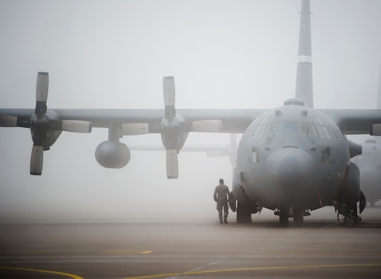 A member of the Kentucky Air National Guard performs preflight checks on a C-130H Hercules, Eindhoven, Netherlands, Sept. 20, 2014. Aircraft and aircrew from five nations flew to the Netherlands to reenact Operation Market Garden in honor of those who were lost liberating the country. (U.S. Air Force photo/Senior Airman Damon Kasberg)