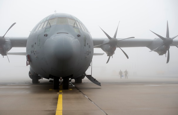 U.S. Air Force pilots from the 37th Airlift Squadron head out to a U.S. Air Force C-130J Super Hercules, Eindhoven, Netherlands, Sept. 20, 2014. The 37th AS took part in a reenactment of Operation Market Garden to honor those who were lost during the liberation of the Netherlands in World War II. (U.S. Air Force photo/Senior Airman Damon Kasberg)