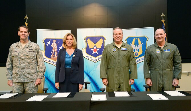 Leaders of the Air Force and the Air Reserve Component gathered for an Aircrew Summit to sign the Total Force Aircrew Management Charter Sept. 18 at the Air Force Association convention in Washington, D.C. From left, Lt. Gen. Stanley E. Clarke, director, Air National Guard, Deborah Lee James, Secretary of the Air Force, Gen. Mark A. Welsh, III, Air Force Chief of Staff, and Lt. Gen. James F. Jackson, chief of the Air Force Reserve, prepare to sign the charter which integrates Total Force Management of resources across the active duty, Guard and Reserve to maximize combat readiness. (U.S. Air Force photo/Scott Ash)
