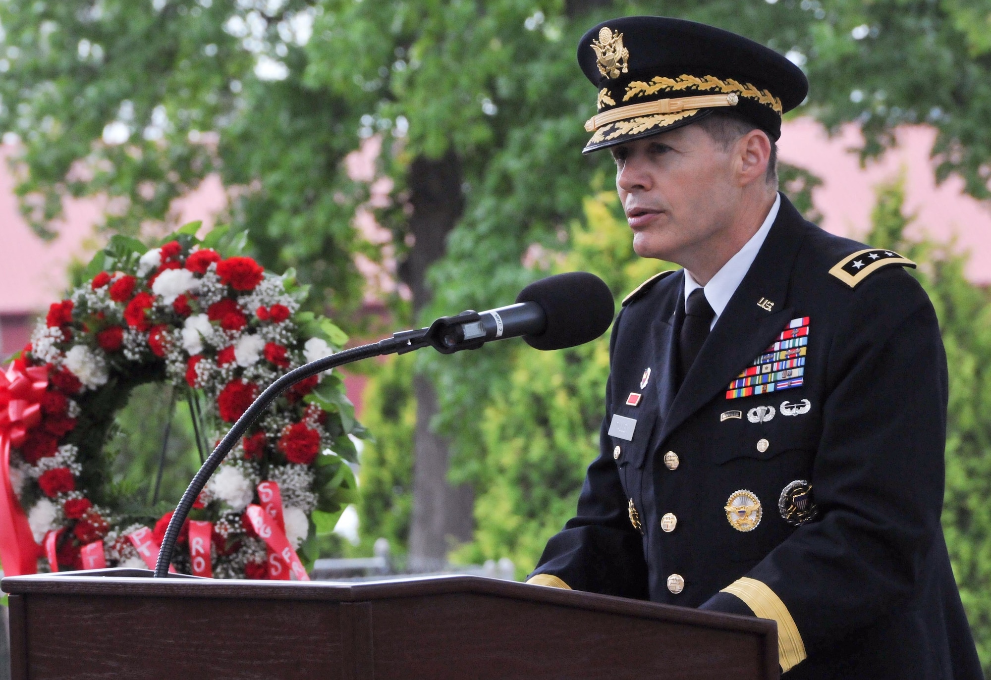 Lt. Gen. Jeffrey W. Talley, chief of Army Reserve and commanding general of United States Army Reserve Command, speaks during the 9/11 Remembrance Ceremony Sept. 13 at the Ernie Pyle U.S. Army Reserve Center on Fort Totten, N.Y. The event honored six New York-area Army Reserve Soldiers – Lt. Col. William Pohlmann, Capt. Mark Whitford, Capt. Michael Mullan, Warrant Officer Ronald Bucca, Staff Sgt. Frederick Ill and Sgt. Shawn Powell - who were killed in the terrorist attacks against the United States on Sept. 11, 2001. (U.S. Army photo by Staff Sgt. Shawn Morris/Released)