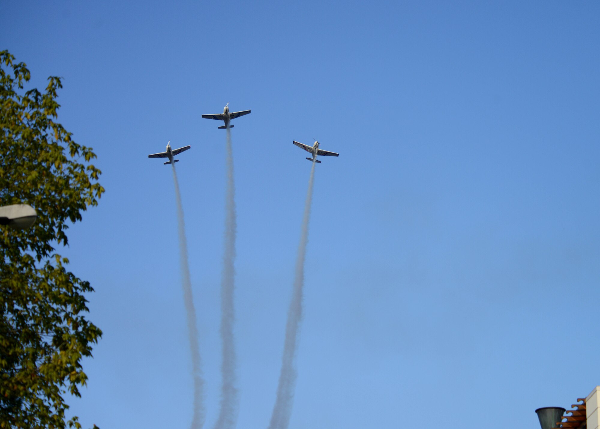 The Aero Club of Pordenone performs a flyover during the 13th Annual Italian-American Friendship Festival, Sept. 20, 2014, in Sacile Italy. During the festival, guests were entertained by demonstrations from American and Italian firefighters, sporting events and food. (U.S. Air Force photo/Airman 1st Class Deana Heitzman)