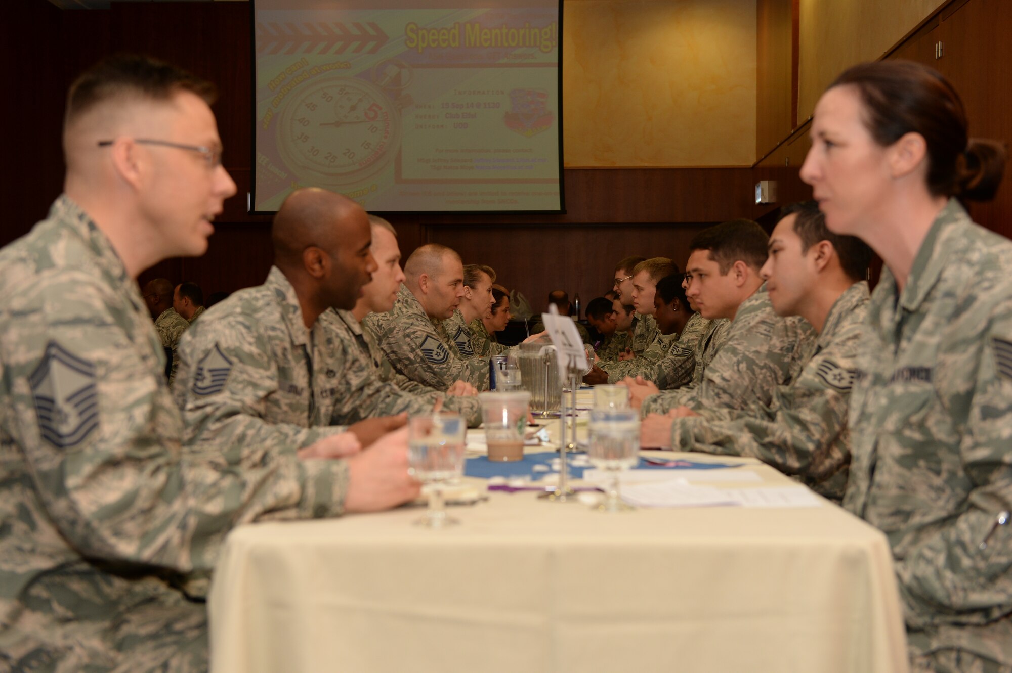 U.S. Air Force Airmen participate in the 52nd Fighter Wing’s inaugural speed mentoring event Sept. 19, 2014, at Spangdahlem Air Base, Germany. Airmen switched mentors every three minutes and met more than 10 different senior NCOs before the event concluded. (U.S. Air Force photo by Airman 1st Class Dylan Nuckolls/Released)
