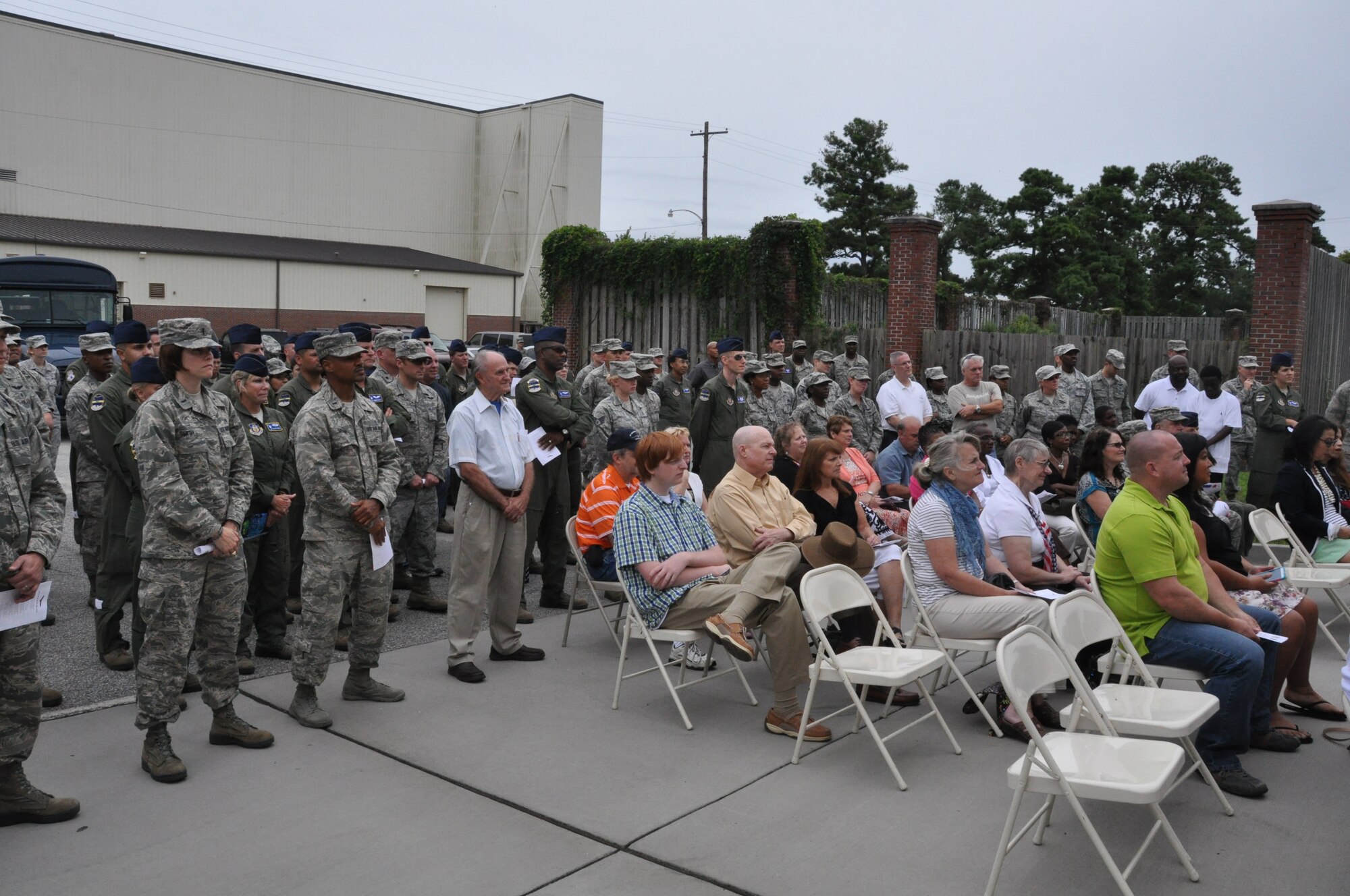 Members of the 315th Airlift Wing listen in as Building 416 is officially named the Master Sergeant Ronald A. Hall Aeromedical Evacuation Operations Facility during a dedication ceremony held at Joint Base Charleston, S.C. The building was named after Master Sgt. Ronald Hall, who spent 24 of his 28 years in the Air Force as a member of the 315th Aeromedical Evacuation Squadron. After years of dedicated service to the military, Hall passed away in May 2011. (U.S. Air Force photo by Capt. Michaela Judge)