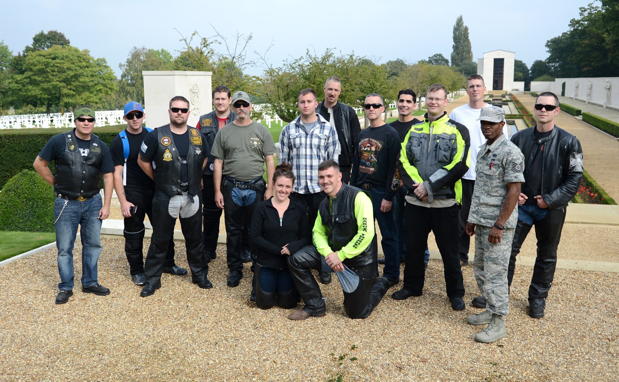 Members of the Rolling Thunder motorcycle rally pose for a photo Sept. 19, 2014, at Madingley American Cemetery, near Cambridge, England. The rally visits the cemetery every year to honor fallen service members as part of Prisoner of War/Missing in Action Remembrance Week. (U.S. Air Force photo/Airman 1st Class Dillon Johnston/Released) 