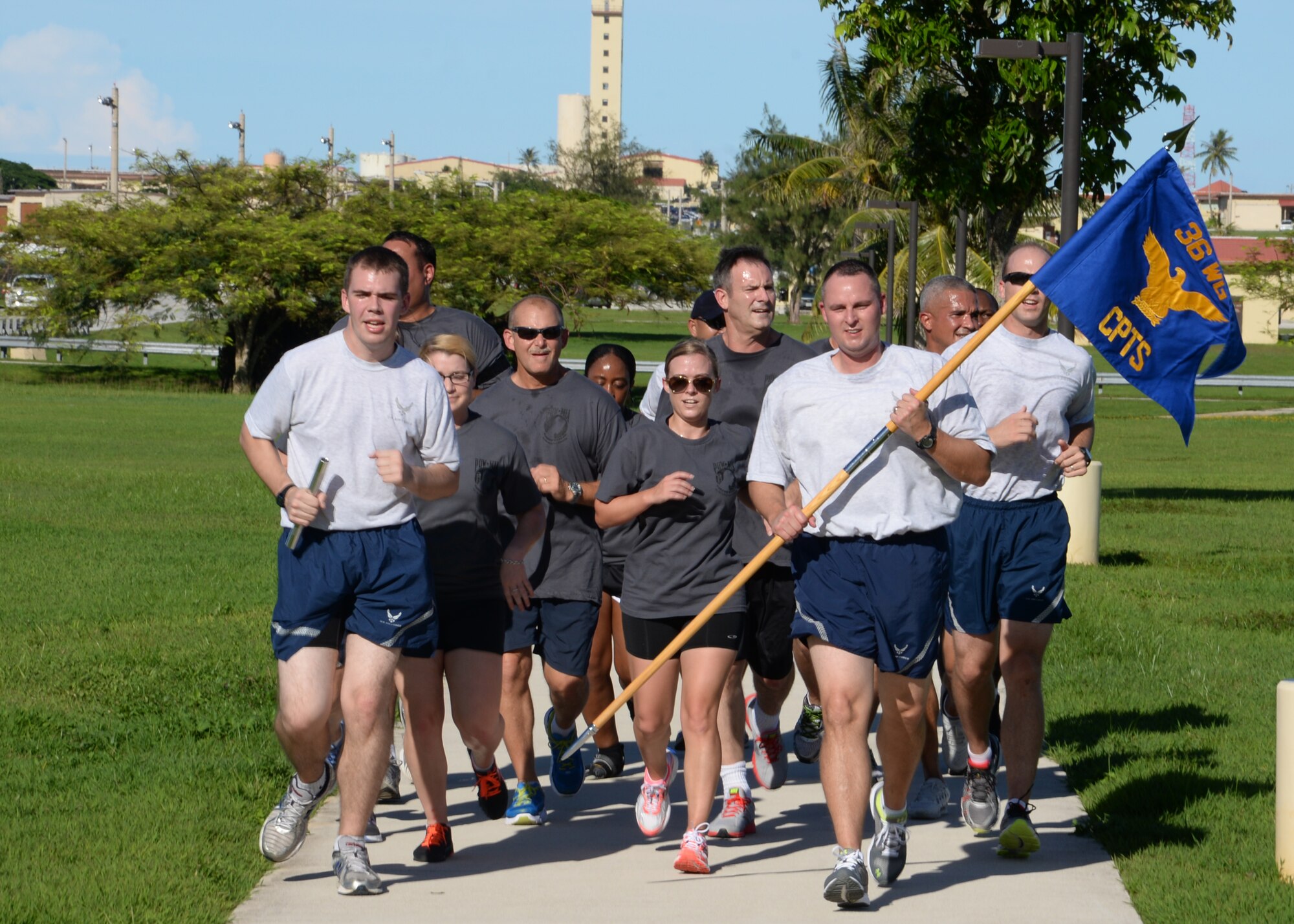 Members of Team Andersen participate in the 24-hr vigilance run to recognize prisoners of war and those missing in action, Sept. 19, 2014, on Andersen Air Force Base, Guam. During the run, squadrons throughout the base ran in one hour increments to honor our POW/MIA. (U.S. Air Force photo by Senior Airman Cierra Presentado/Released)