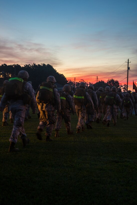 Service members with Headquarters and Service Companies, Headquarters Regiment, 2nd Marine Logistics Group conducted a hike to condition the Marines and sailors for future training exercises with II Marine Expeditionary Force aboard Marine Corps Base Camp Lejeune, N.C., Sept. 19, 2014. The hikes are used for the preparation and sustainment of II MEF units and personnel for upcoming operations.