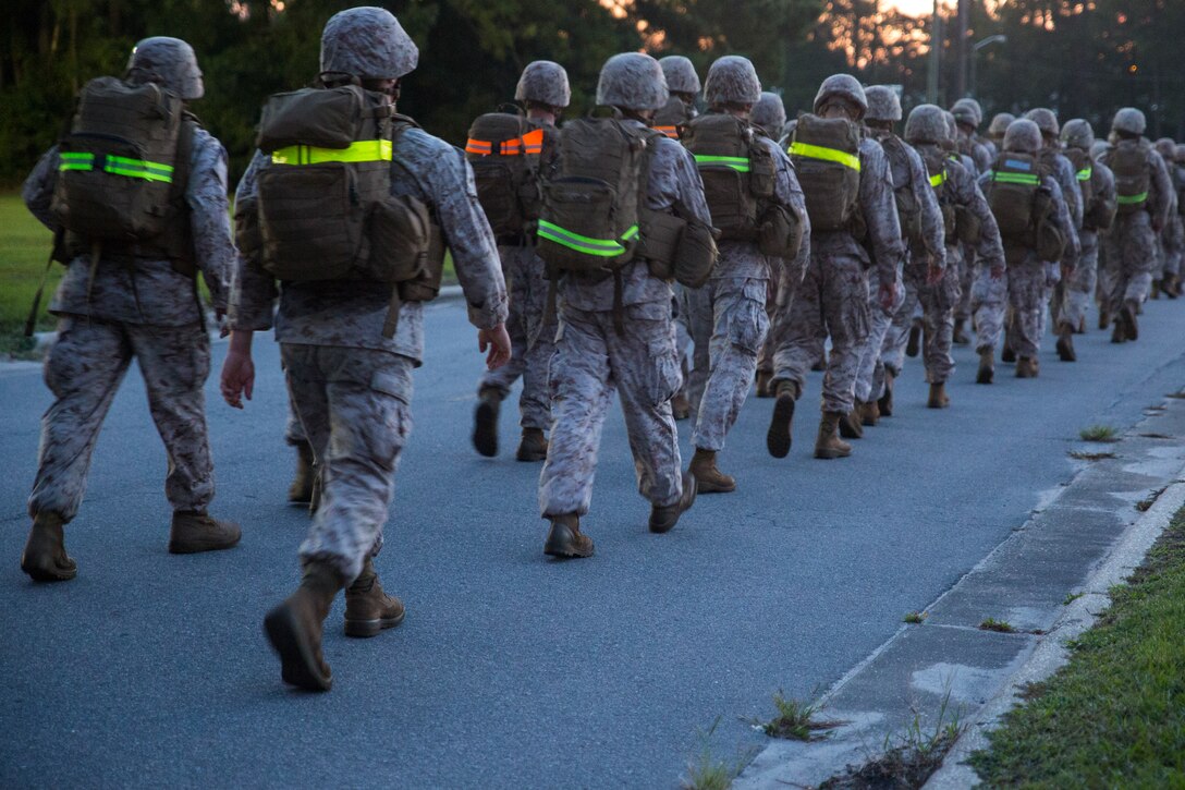 Service members with Headquarters and Service Companies, Headquarters Regiment, 2nd Marine Logistics Group conducted a hike to condition the Marines and sailors for future training exercises with II Marine Expeditionary Force aboard Marine Corps Base Camp Lejeune, N.C., Sept. 19, 2014. The hikes are used for the preparation and sustainment of II MEF units and personnel for upcoming operations.