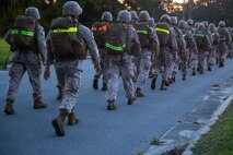 Service members with Headquarters and Service Companies, Headquarters Regiment, 2nd Marine Logistics Group conducted a hike to condition the Marines and sailors for future training exercises with II Marine Expeditionary Force aboard Marine Corps Base Camp Lejeune, N.C., Sept. 19, 2014. The hikes are used for the preparation and sustainment of II MEF units and personnel for upcoming operations.
