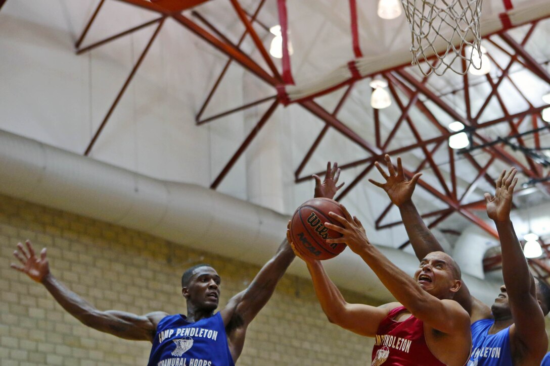 1st Combat Engineer Battalion claimed a 58-44 victory over 9th Communications Battalion in the first round of the playoffs for the Commanding General's Cup basketball league at Paige Fieldhouse, Sept. 22.  1st CEB, the 5th seed, will play the 1st seed, 11th Marines in the semi-finals at the fieldhouse tonight.