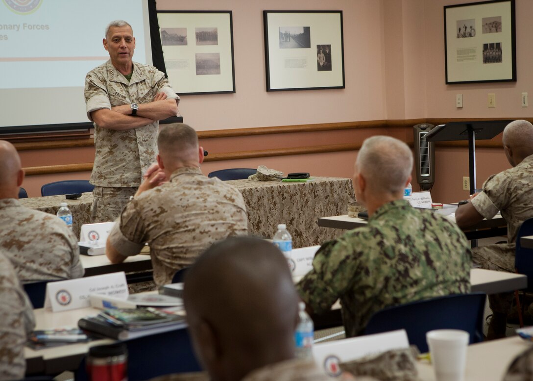 The Assistant Commandant of the Marine Corps, Gen. John M. Paxton, Jr., speaks to Marines attending the Installation Commanders Course on Marine Corps Base Quantico, Va., Sept. 23, 2014. (U.S. Marine Corps photo by Cpl. Tia Dufour/Released)