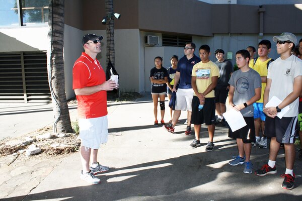 Honolulu District Commander Lt. Col. Chris Crary addresses more than 40 volunteers at Fort DeRussy in Waikiki prior to the Corps-sponsored beach and berm cleanup in honor of National Public Lands Day and International Coastal Cleanup Day. The U.S. Army Corps of Engineers’ Pacific Regional Visitor Center coordinated the event that was supported by Corps employees, Delta Sigma Theta Sorority, and the Punahou Junior ROTC cadets.  

