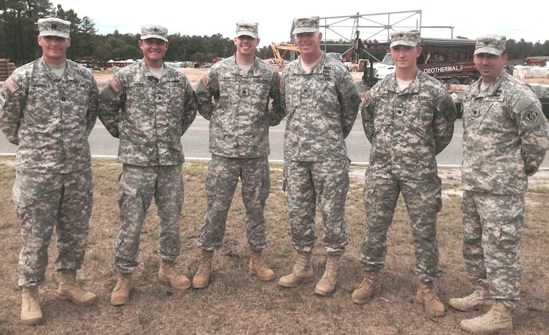 Army Cadet James Oliver (second from right) a civil engineering student in the Reserve Officers Training Corps at the University of Portland (Oregon), has completed an internship with the U.S. Army Corps of Engineers, New York District, receiving a variety of professional development experiences prior to his senior year of college. Here he stands with District leadership and fellow cadets at Joint Base McGuire-Dix-Lakehurst in New Jersey during a site visit July 29, 2014. From Left to Right: Capt. Tim Shebesta,  Cadets Jacob Woicik and Ryan Bunn, District Commander Col. Paul Owen, and Lt. Col. Scott Figlioli (far right).