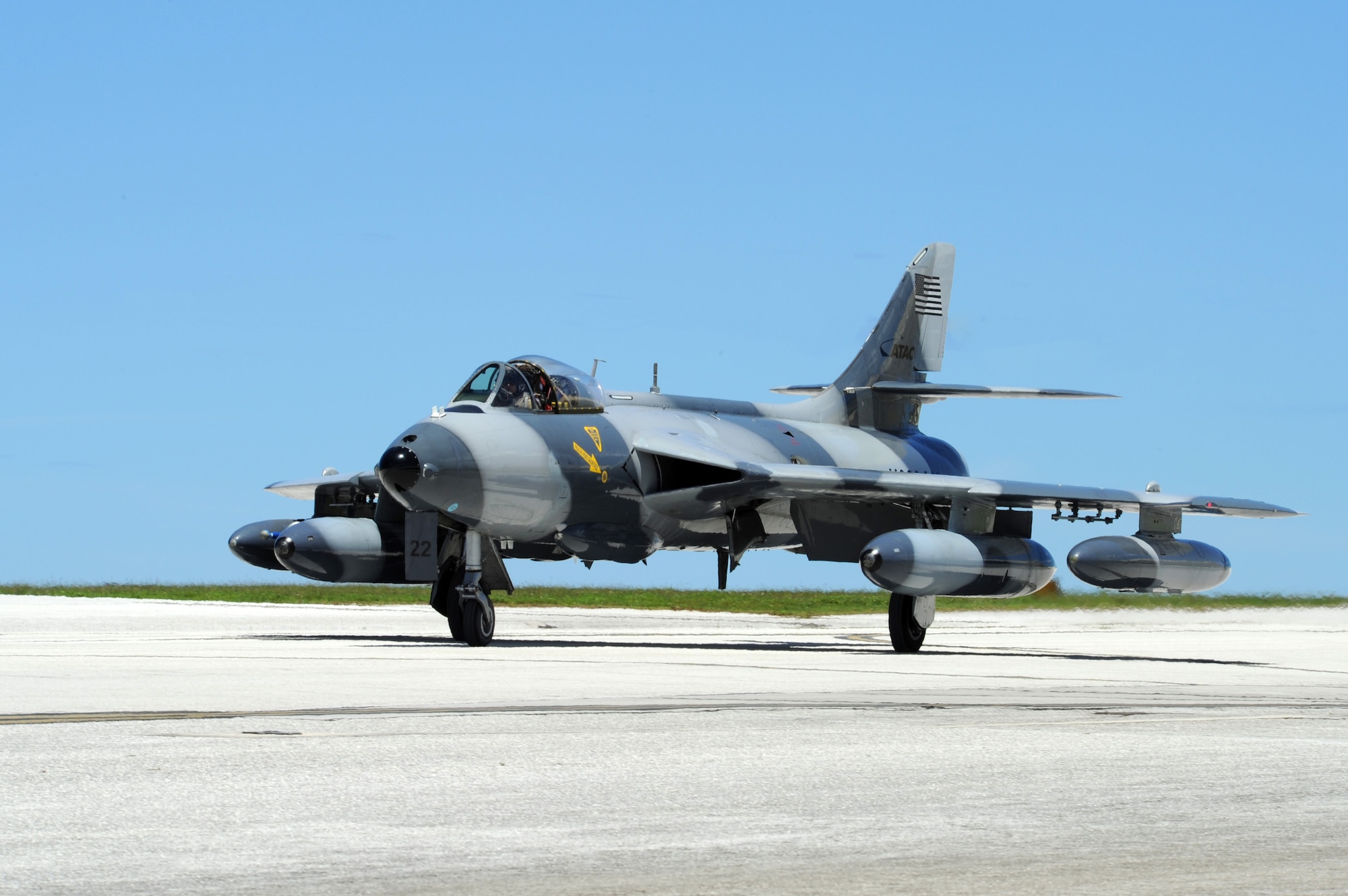 An F-16 aircraft, assigned to the 18th Aggressor Squadron, lands on Andersen Air Force Base in support of Exercise Valiant Shield. Valiant Shield is a training exercise with a focus on integration and proficiency of the U.S. Army, Navy, Air Force and Marine Corps through engaging units at sea, in the air, on land, and in cyberspace in response to the mission. (U.S. Navy photo by Mass Communication Specialist 2nd Class Chelsy Alamina)