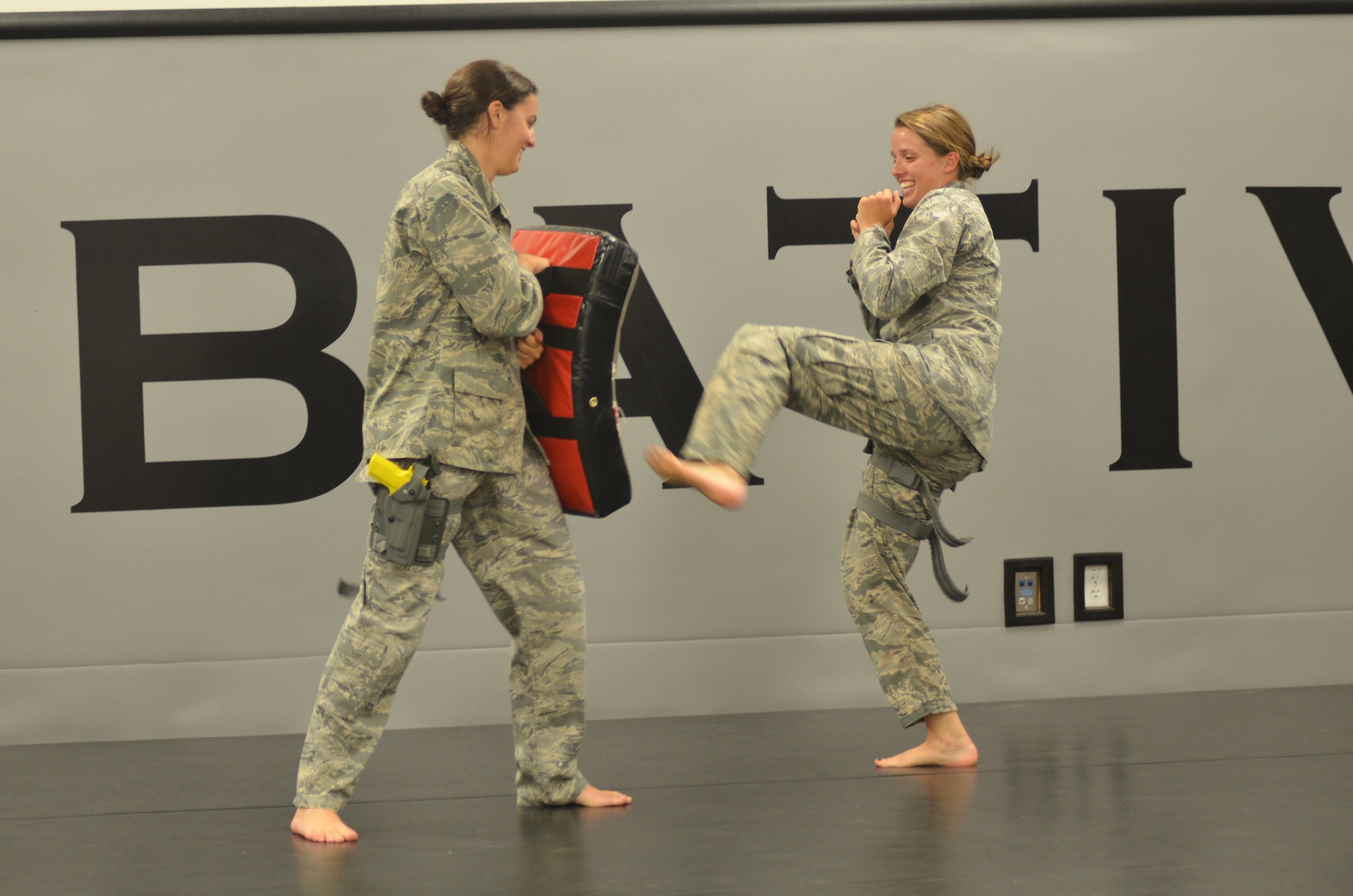 Academy cadets Sydney Rower (left) and Abby Wolters spar during a Combative Class here Sept. 19. The three-part course is a graduation requirement for cadets. (U.S. Air Force photo/Amber Baillie)