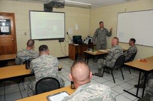 U.S. Air Force Tech. Sgt Brian Lilienthal, Air Advisor Academy instructor, teaches 612th Air Base Squadron firefighters about the Guatemalan culture.  Twelve members from the 612th Air Base Squadron Fire Emergency Services completed the Air Advisor Academy 5-day academic Mobile Training Team course Sept. 15-19 to become the first group to receive air advisor training qualified to provide partner nation firefighting training.  The Air Advisor training supplied the Airmen with a broad picture of building cooperative relations with their Central American counterparts.  (Photo by U.S. Air National Guard Capt. Steven Stubbs)