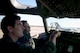 1st Lt. Christopher Lee (left), 4th Airlift Squadron pilot, identifies to Will Krajewski, what the different buttons and knobs do in a C-17 Globemaster III Sept. 19, 2014, during his Pilot for a Day tour at Joint Base Lewis-McChord, Wash. Krajewski learned about the different parts and functions of the C-17 along with the duties of the Airmen that work on the aircraft. (U.S. Air Force photo/Airman 1st Class Keoni Chavarria)