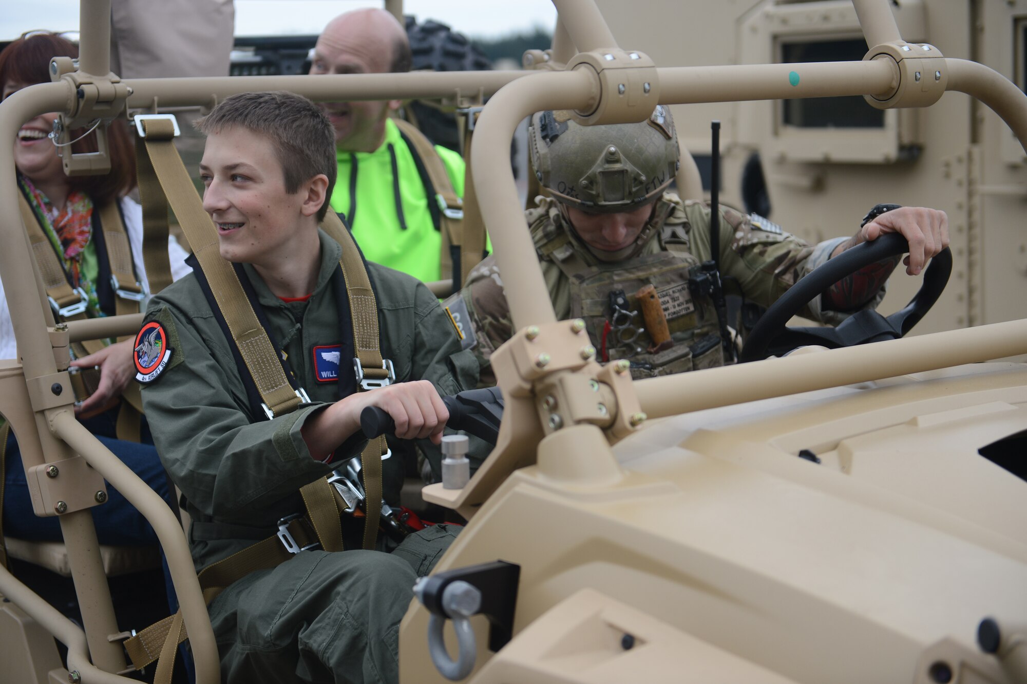 Will Krajewski rides in an all-terrain vehicle Sept. 19, 2014 after a presentation from the 22nd Special Tactics Squadron during his Pilot for a Day tour at Joint Base Lewis-McChord, Wash. Krajewski met members from numerous squadrons on the base and learned more about their careers. (U.S. Air Force photo/Airman 1st Class Keoni Chavarria)