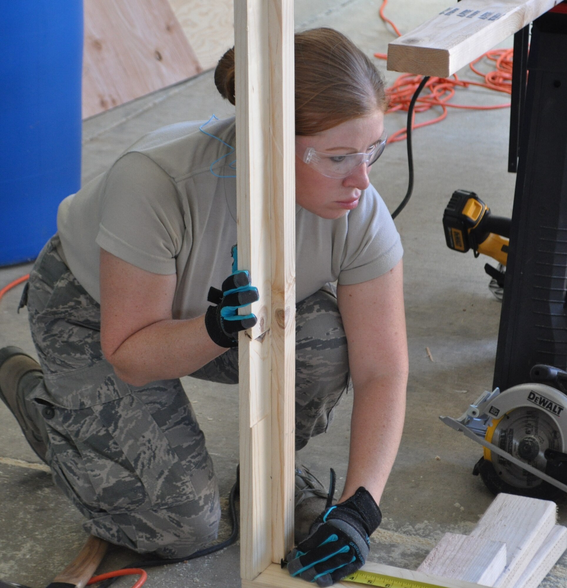 TRAVIS AIR FORCE BASE, Calif. -- The 349th Civil Engineer Squadron is building a shed, so they can burn it, and finally blow it up. To the most casual observer, this might seem odd, even wasteful, but they’re doing it all for valuable training that will aid the warfighter. Thirteen different specialty codes encompassed by CE benefit directly from this project, providing seasoning training, on-the-job training, and annual tour opportunity for Airmen working on skill level upgrade and job proficiency. (U.S. Air Force photo/Ellen Hatfield)
