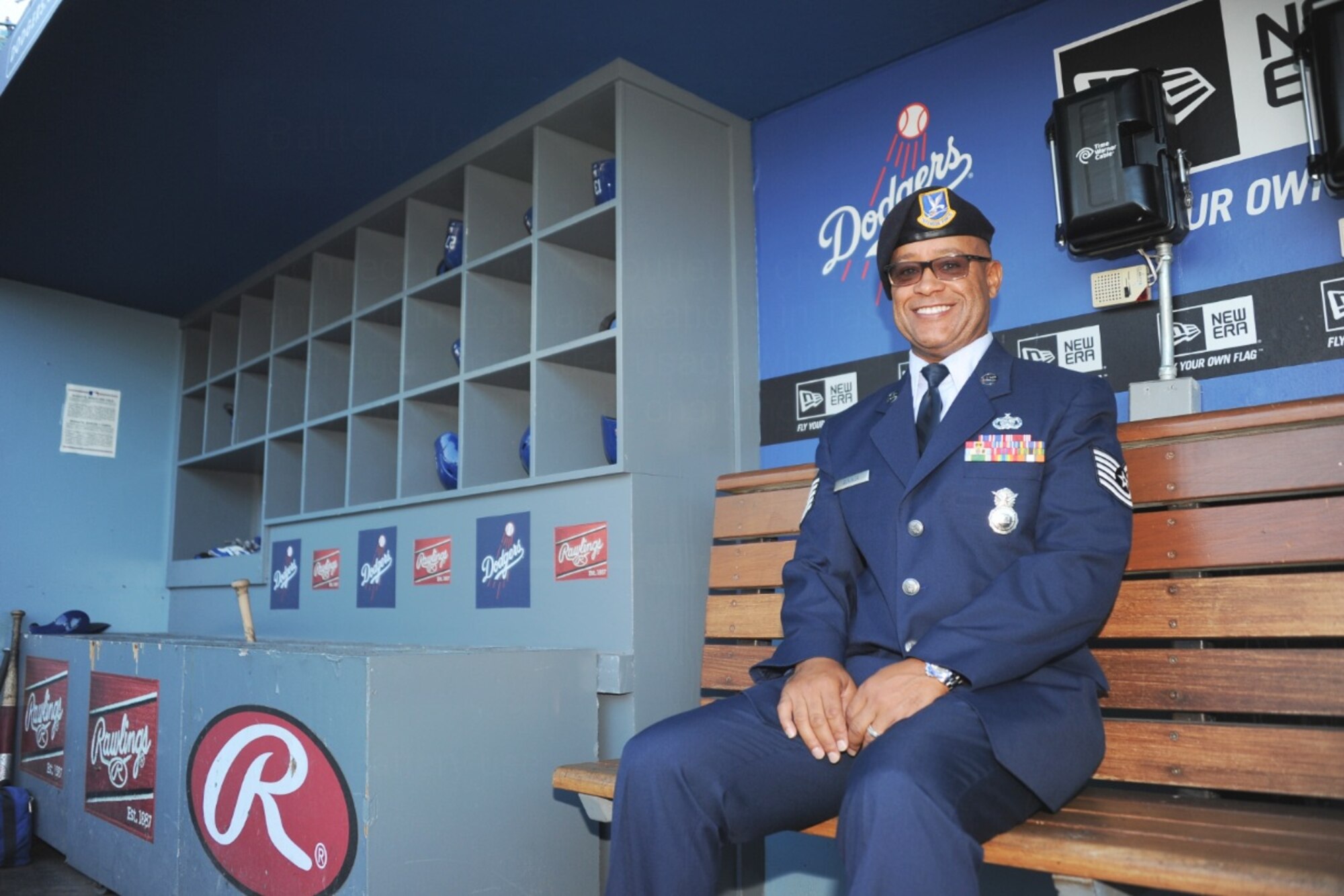 Tech. Sgt. Robert Sumner, 412th Security Forces Squadron, sits in the Los Angeles Dodgers dugout Aug. 23 before a game against the New York Mets. Sumner was honored as the Veteran of the Game that day. The L.A. Dodgers along with Bank of America honor active duty and retired military members at every home game by treating them and their families to Field level tickets, watching batting practice on the field and being honored on the field during pregame ceremonies. (Courtesy photo) 


