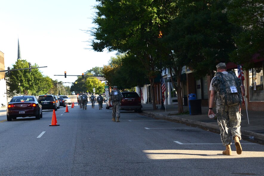 Military members and first responders participate in the Hurricane Hike through downtown Camden, S.C., Sept. 20, 2014. The 10K hike was sponsored by the S.C. State National Guard and represents the guard’s readiness in the event of a natural disaster. (U.S. Air Force photo by Airman 1st Class Diana M. Cossaboom/Released)