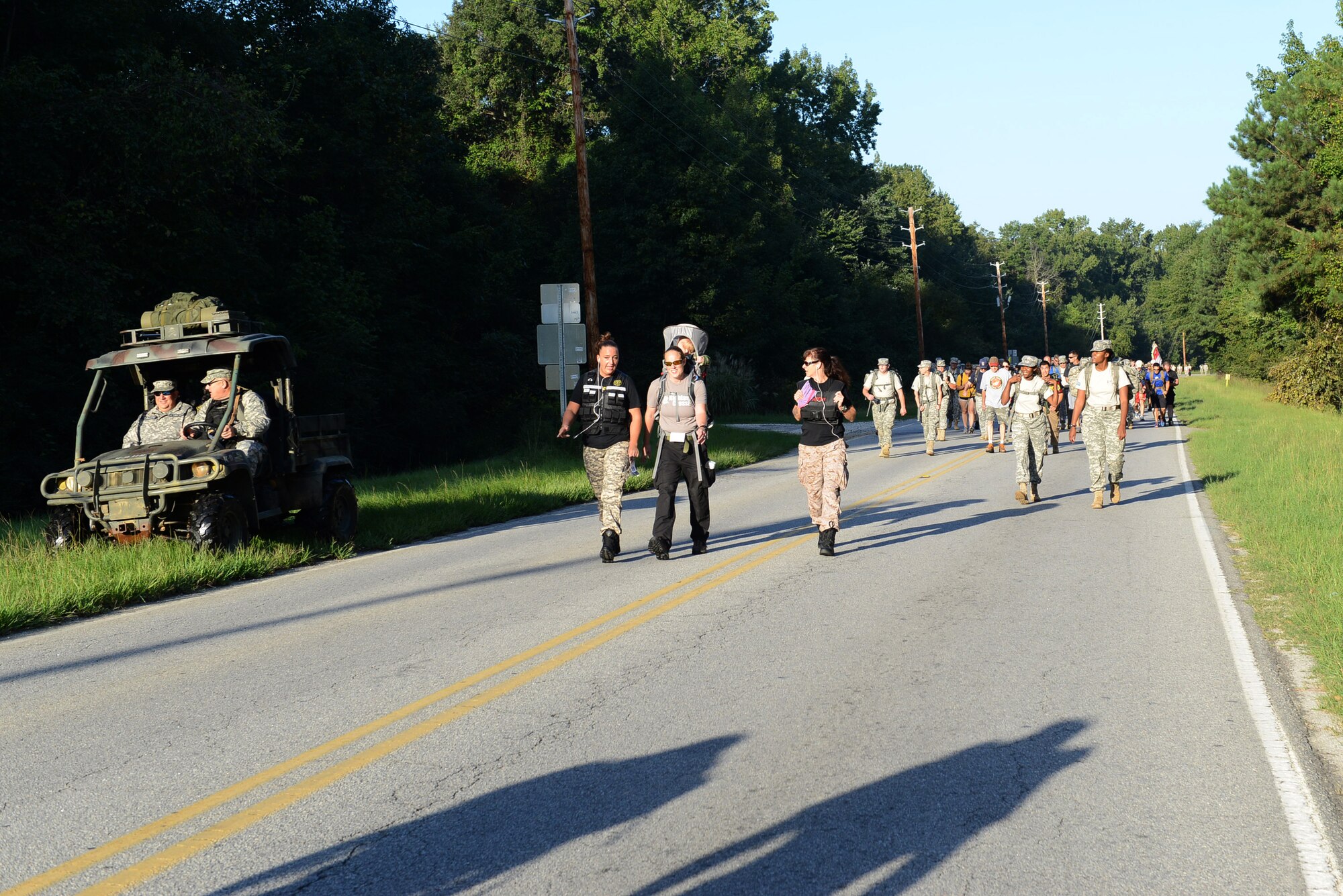 Military members and first responders hike through the streets of Camden, S.C., Sept. 20, 2014. Following the 10K hike, participants were provided lunch and an awards ceremony took place commemorating those finishing among the top three individually and within groups. (U.S. Air Force photo by Airman 1st Class Diana M. Cossaboom/Released)